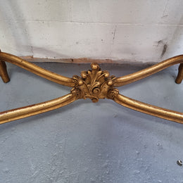 French Louis XV style carved center table with a stunning marble top and original gilt. In good original detailed condition.