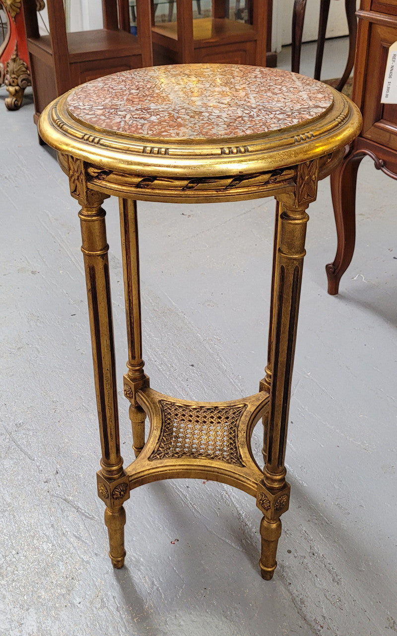 Late 19th Century French Louis XVI style round marble top side table/ lamp table. It is in good original detailed condition and has been sourced from France.