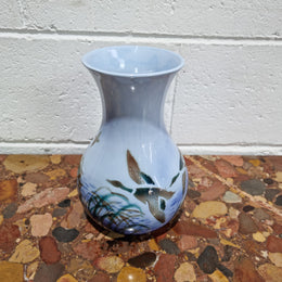 Lovely vintage vase by Falconware potteries, featuring ducks flying over reeds on a lake. It has some crazing, but no damage. Good condition, commensurate with the age, please view photos.