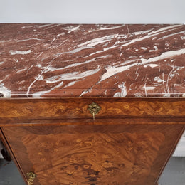 Elegant French transitional style Walnut & Kingwood Salon cabinet. It has beautiful marquetry inlay, a marble top and decorative ormolu mounts. Sourced From France and is in good original detailed condition.