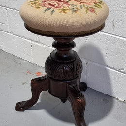 Beautiful Late Victorian Floral tapestry covered revolving piano stool. It is in very good original detailed condition. It has a original David Jones label underneath .