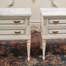 Attractive pair of Vintage French Louis 16th style two drawer marble topped bedsides. They have been sourced from France and are in good original condition.