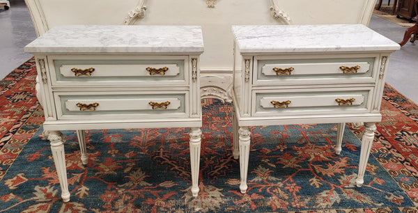 Attractive pair of Vintage French Louis 16th style two drawer marble topped bedsides. They have been sourced from France and are in good original condition.