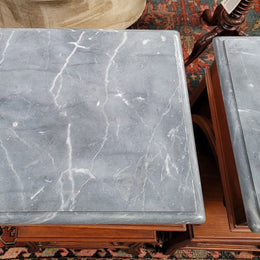 Pair of unusual transitional fruit wood marble top bedside cabinets. They have been sourced from France and are in good original detailed condition.
