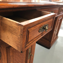 Antique french oak partners desk with plenty of drawers and cupboards and has an inbuilt Chubb Safe with keys. In very good condition.