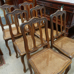 Fabulous set of 6 French oak dining chairs with cane seating in fantastic original condition.