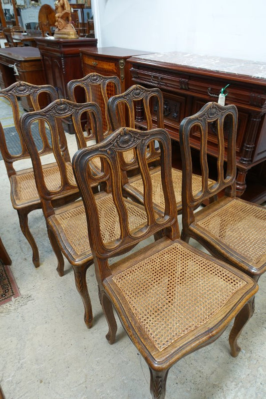 Fabulous set of 6 French oak dining chairs with cane seating in fantastic original condition.