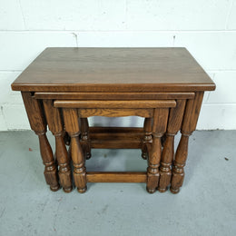 Vintage nest of three French Oak tables. In very good original detailed condition.