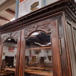 Substantial French Henry 2nd Walnut two door bookcase. It has five fully adjustable shelves and has been sourced from France. It is in good original detailed condition.