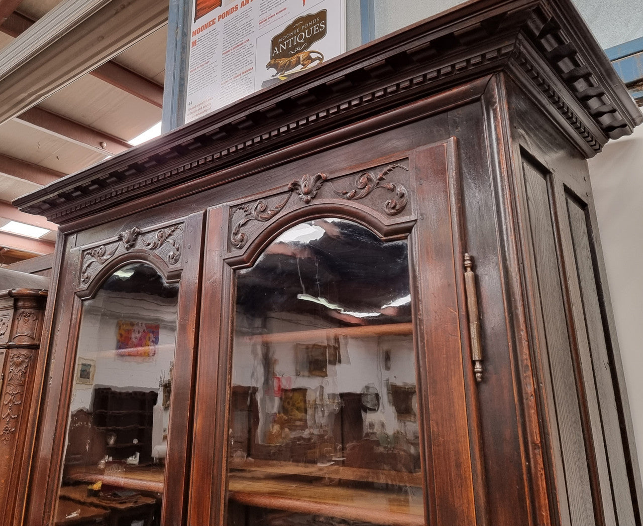 Substantial French Henry 2nd Walnut two door bookcase. It has five fully adjustable shelves and has been sourced from France. It is in good original detailed condition.