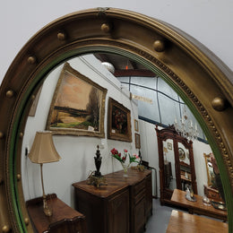 Large round French gilt framed convex mirror. It is a hard to find size with a total diameter of 67 cm. It has been sourced from France and is in good original condition.