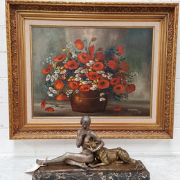 Lovely Vintage signed floral oil on canvas of Poppies and Daisy's and in a decorative gilt frame . In good original detailed condition.