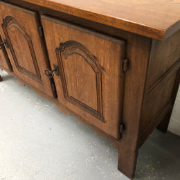 Solid and rustic French oak three door cabinet with plenty of room for storage and all doors lock with heavy duty iron keys.