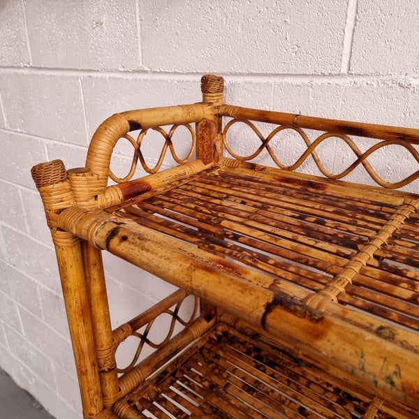 Vintage Tortoiseshell Bamboo Shelves.  Good size unit with irregular shelves. It is in good original condition and it very solid.