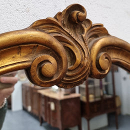 French Louis XV style wood carved and gilded mirror. Mirror is original and showing signs of age. It has been sourced from France and  in good original condition.