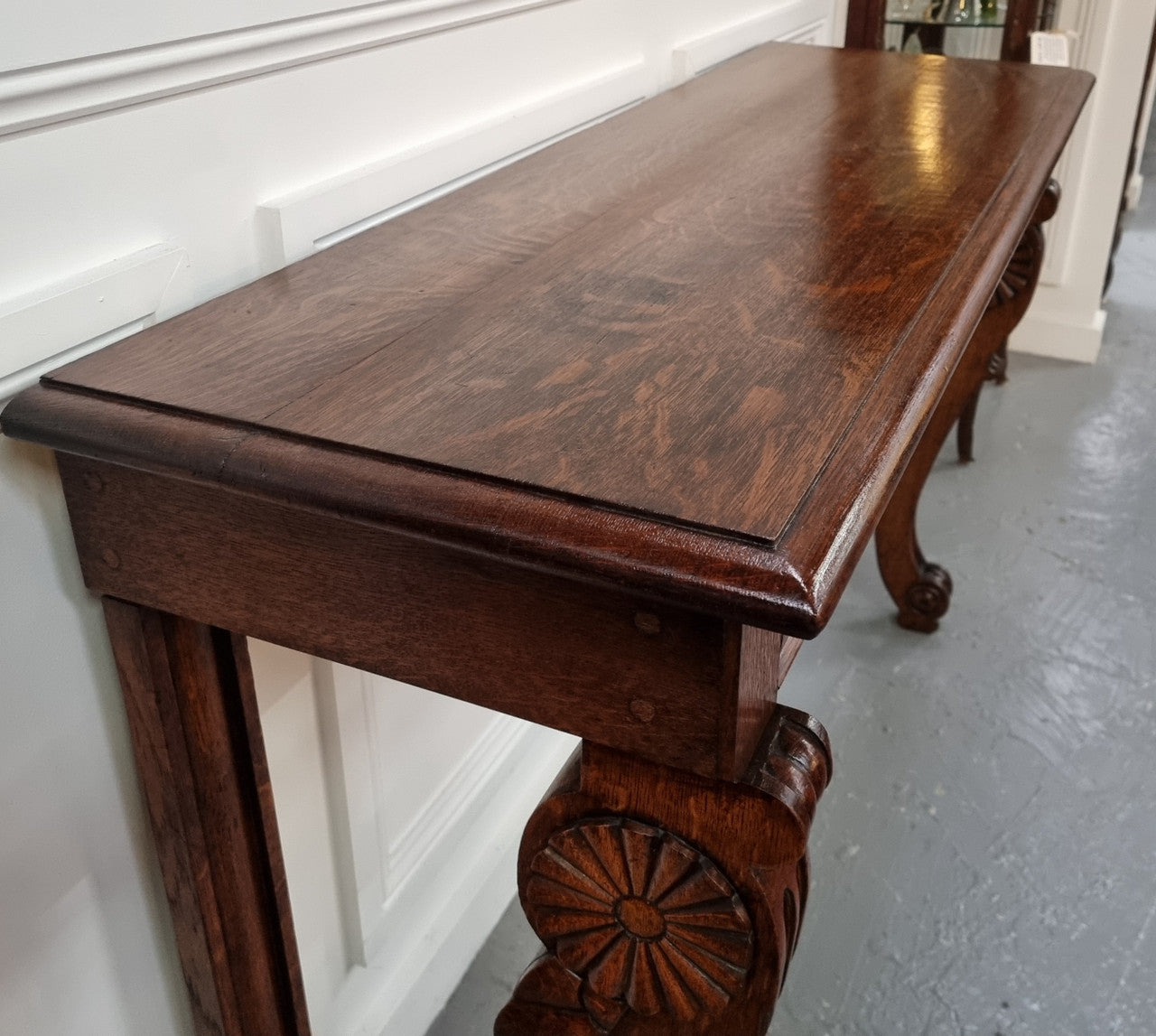 Beautiful 19th Century French Oak console table of great narrow proportions. It has been sourced from France and it is good original detailed condition.