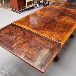 Renaissance style Oak extension table with parquetry top and twin pedestal base. The table extends by pulling out an extension leaf either side making it 287 cm long. Sourced from France and in good original detailed condition.