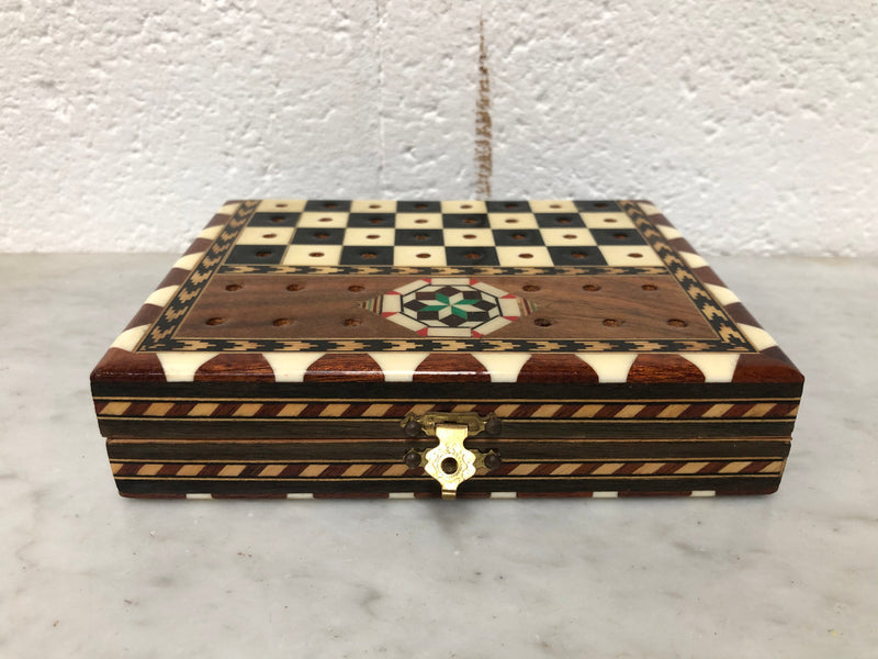 Vintage inlaid folded chess board box with pieces inside. In good clean original condition.