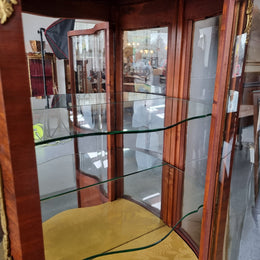 Lovely Vintage French Louis XVth style Vitrine. It has lovely gilt mount details and two glass shelves with room also for storage in good original condition.