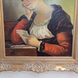 Large gilt framed signed oil on canvas portrait of a maiden readings. In good original detailed condition.