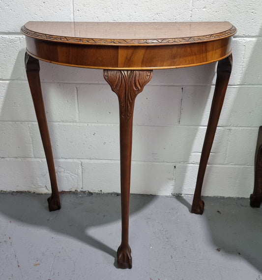 Chippendale style half round hall table. It is in good original detailed condition.