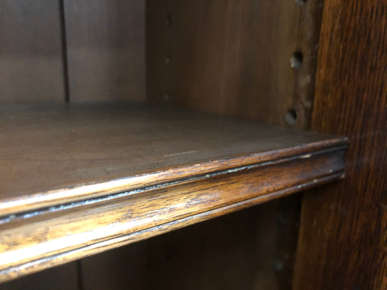 Amazing six-door Oak English bookcase sourced from France. The top section has adjustable shelves and plenty of storage space below which has fixed shelves. Keys and locks in working condition. In good original detailed condition. Circa 1880.