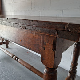Appealing and rare French Oak Farmhouse extension table. Charming character to the top and comfortably seats 12 people. In good original detailed condition.