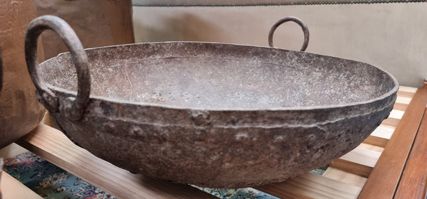 Early 19th Century rustic cast iron handled pan with a rich patina. It is in good original condition.