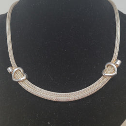 Beautiful Italian sterling silver woven double heart necklace. In good condition.