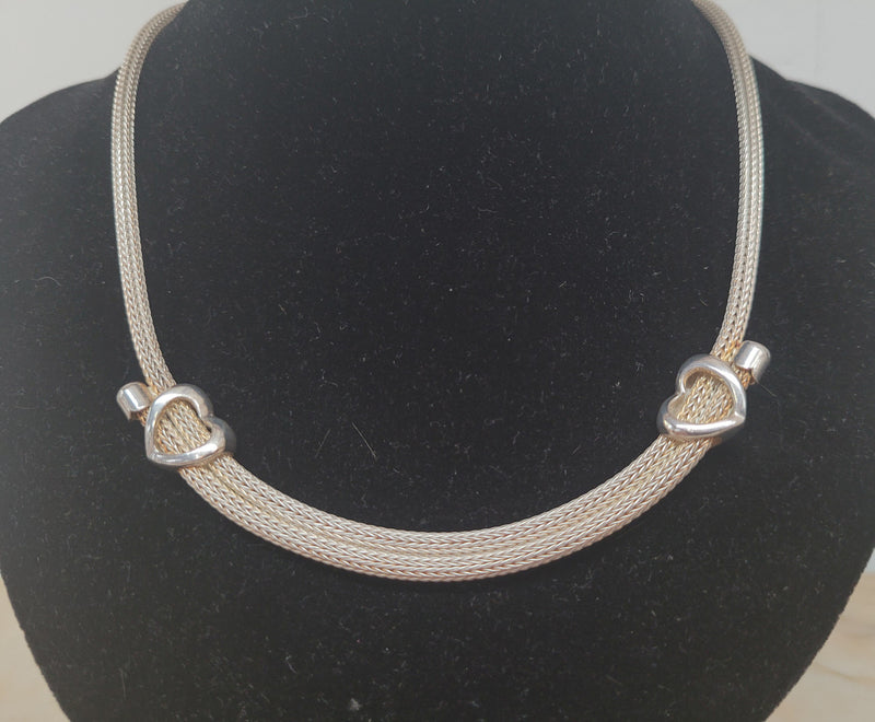 Beautiful Italian sterling silver woven double heart necklace. In good condition.