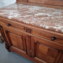 French 19th Century carved walnut Dressing table with a lovely marble top and decorative mirror. There are two cupboards and drawers for all your storage needs and in good original detailed condition.