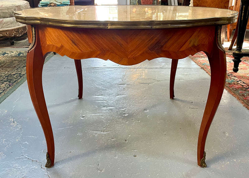 French Louis XV style marquetry inlaid marble top coffee table. In good original detailed condition.