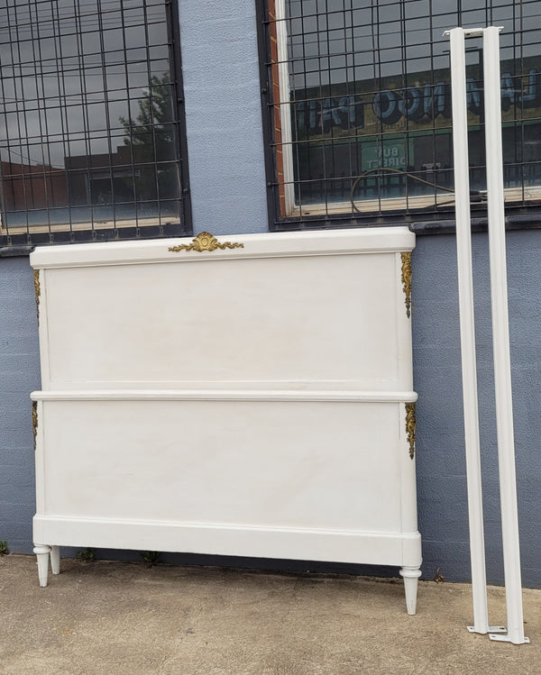 French Louis 16th style chalk painted queen size bed with gilt decorative mounts and includes custom slats. It has been sourced from France and in good original condition.