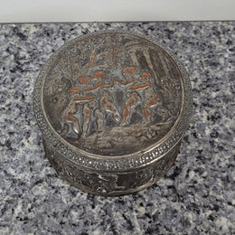 Unusual Antique silver over pottery Italian trinket box nicely decorated with Cherubs. It is in good original condition, please view photos as they help form part of the description.