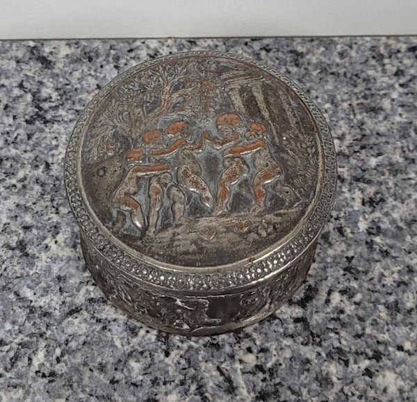 Unusual Antique silver over pottery Italian trinket box nicely decorated with Cherubs. It is in good original condition, please view photos as they help form part of the description.