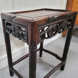 Chinese Rose wood occasional table. Nicely carved and could be used as a coffee table or and occasional table. It is in good original condition.