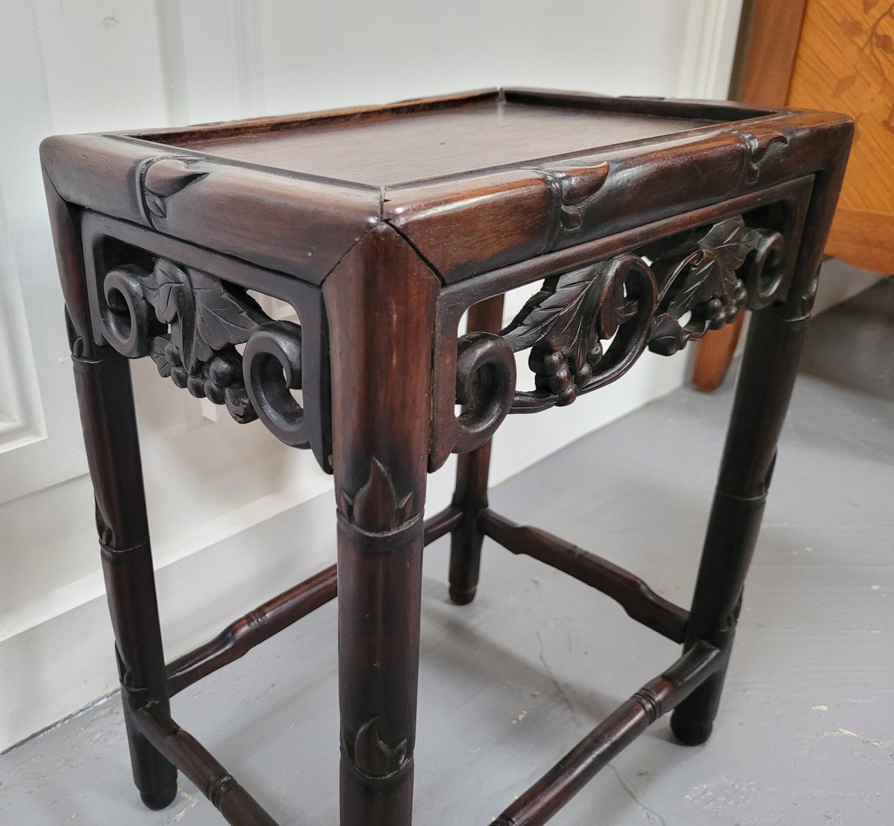 Chinese Rose wood occasional table. Nicely carved and could be used as a coffee table or and occasional table. It is in good original condition.