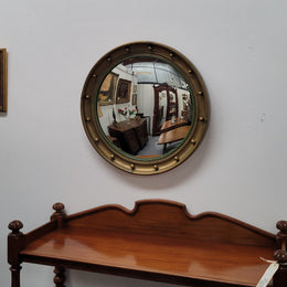 Large round French gilt framed convex mirror. It is a hard to find size with a total diameter of 67 cm. It has been sourced from France and is in good original condition.