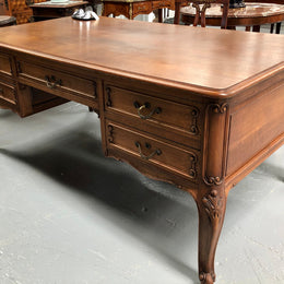 French Oak Louis XV style full partners desk with both sides having five functional drawers. In very good original detailed condition.