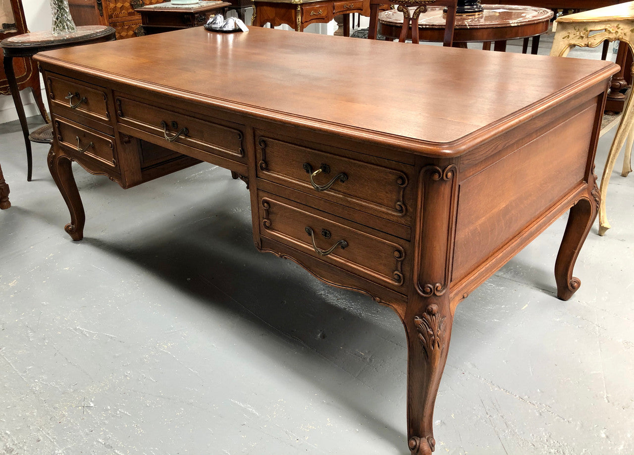 French Oak Louis XV style full partners desk with both sides having five functional drawers. In very good original detailed condition.