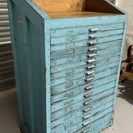 Fabulous set of vintage painted blue printers drawers that have adjustable separators which can be taken out for large papers. The drawers are various sizes and there is a section on top for working on or for storing brushes or tall items . These would be perfect for artists or jewellery pieces or even architects. Such a beautiful piece of industrial furniture.