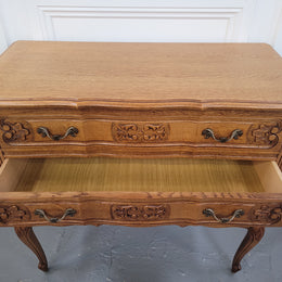 French Oak Louis 15th style nicely carved three drawer wooden top commode. It has been sourced from France and is in good original detailed condition.