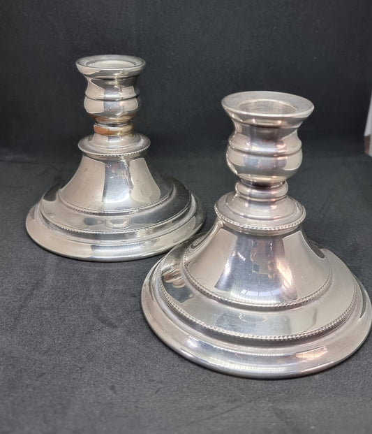 Beautiful pair of silver plate Walker and Hall candle Holders which are nice and heavy and in good condition.