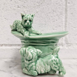 Vintage Sylvac number 1484 green cat and dog playing on top hat. Very cute and in very good condition, no chips or cracks. Please see photos as they form part of the description.