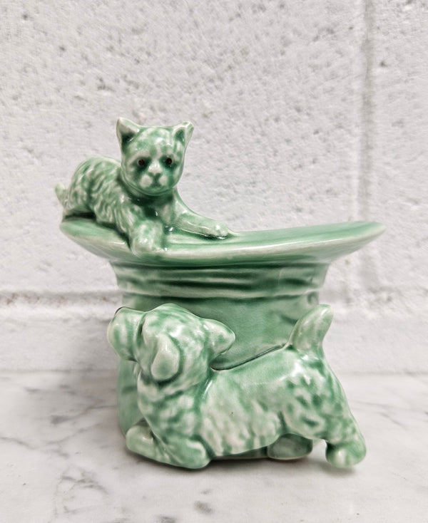 Vintage Sylvac number 1484 green cat and dog playing on top hat. Very cute and in very good condition, no chips or cracks. Please see photos as they form part of the description.