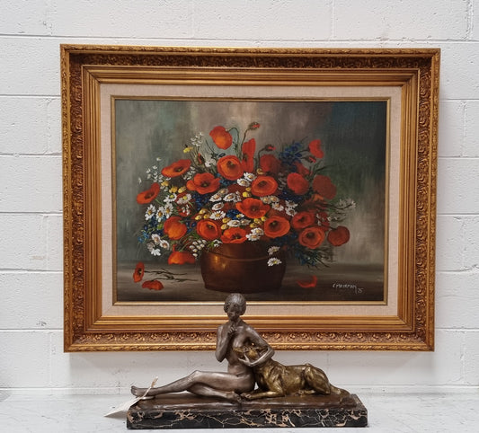Lovely Vintage signed floral oil on canvas of Poppies and Daisy's and in a decorative gilt frame . In good original detailed condition.