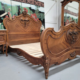 Beautifully carved French Walnut 19th Century queen bed head, foot and rails. It is in good detailed condition