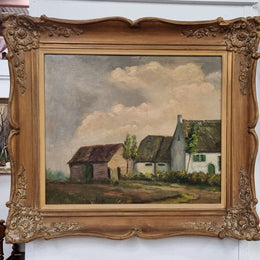 French signed oil on canvas depicting farmhouse in a lovely gilt frame. It is in good original detailed condition and has been sourced from France.