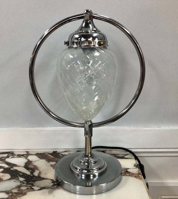 Decorative Art Deco chrome and glass table lamp that has been rewired and is in good original condition.