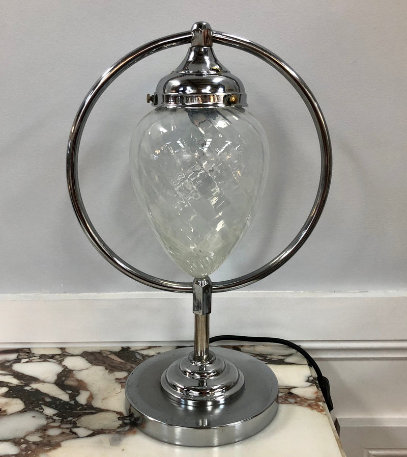 Decorative Art Deco chrome and glass table lamp that has been rewired and is in good original condition.